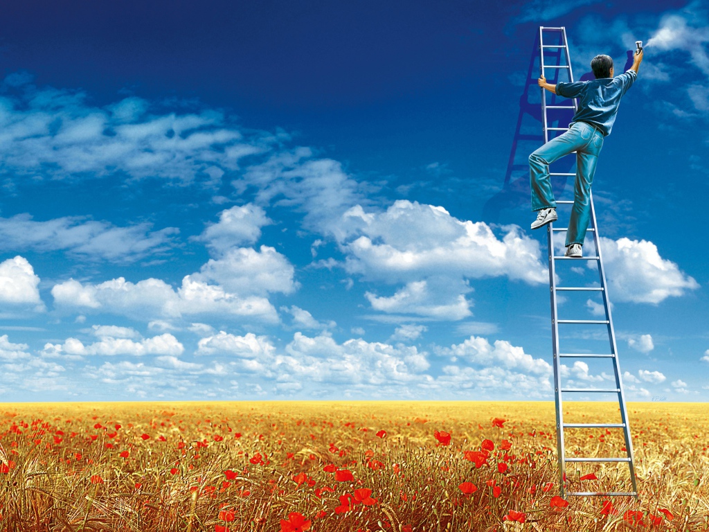 Маляр рисует облака