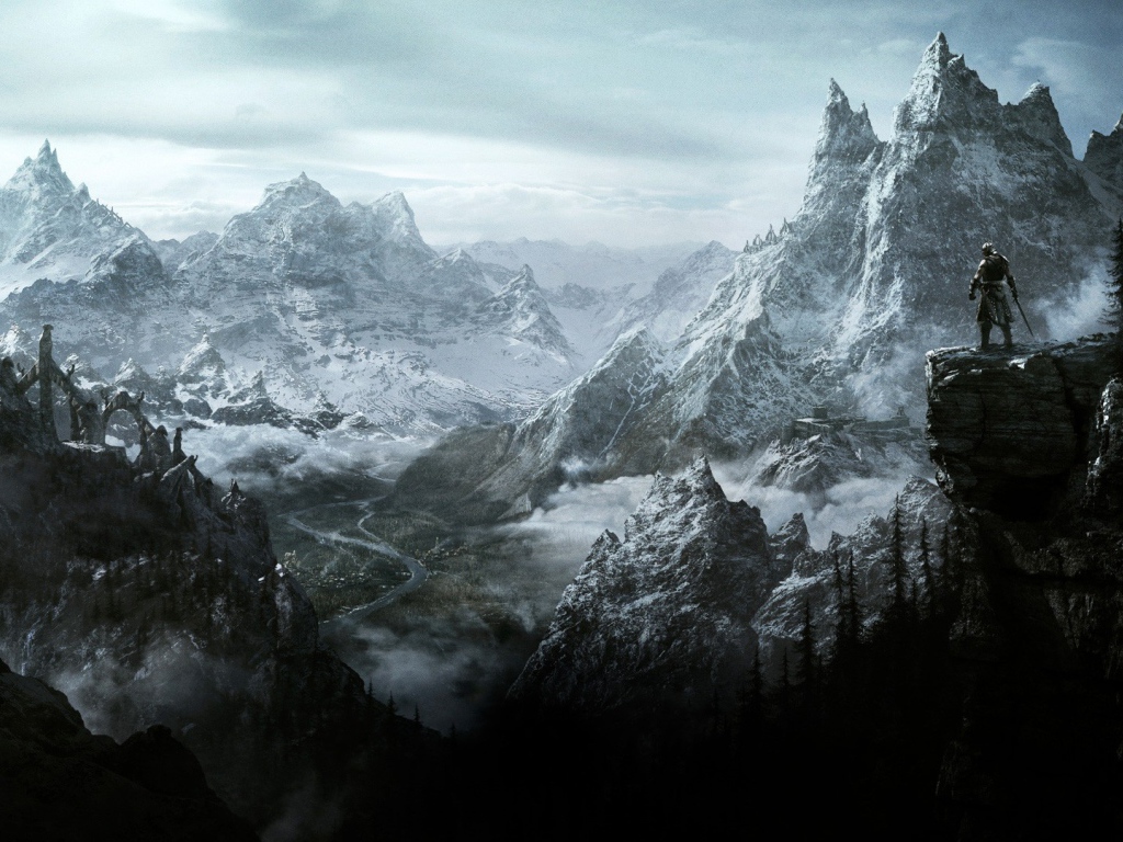 Воин стоит на скале и смотрит в долину