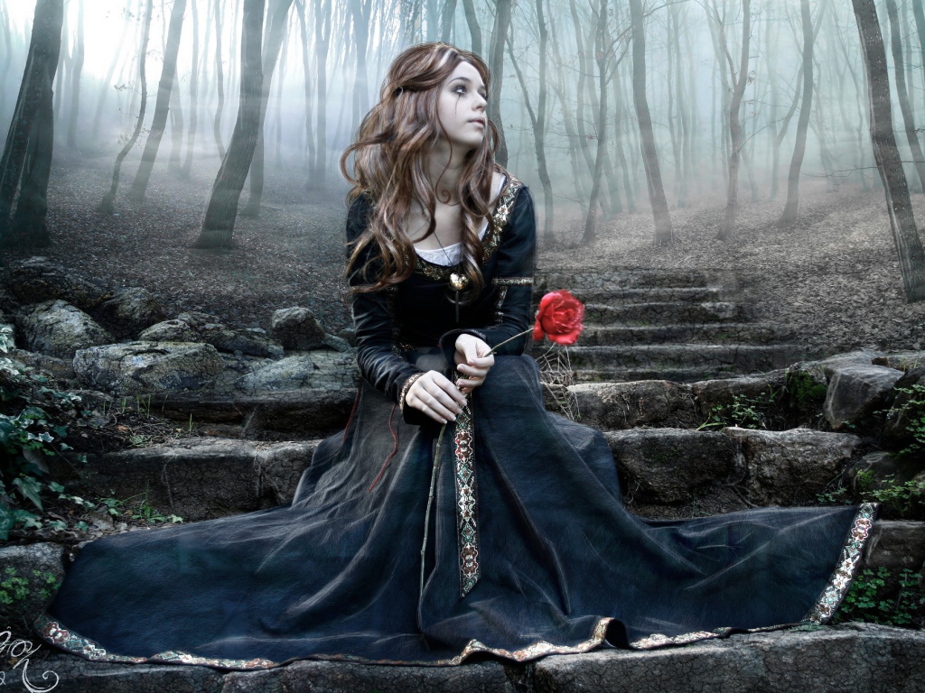 Девушка в черном платье и розой в руке сидит на каменной лестнице