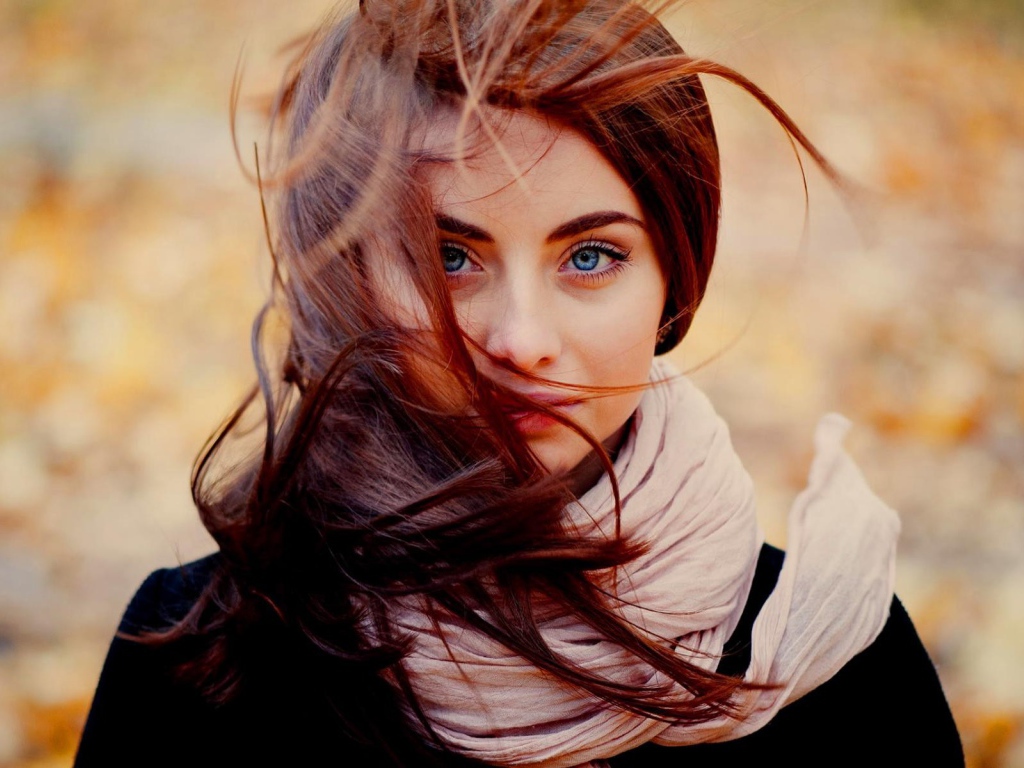 The wind ruffled the hair of the girl