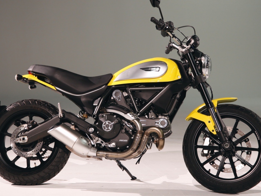 Black and yellow bike Ducati Scrambler