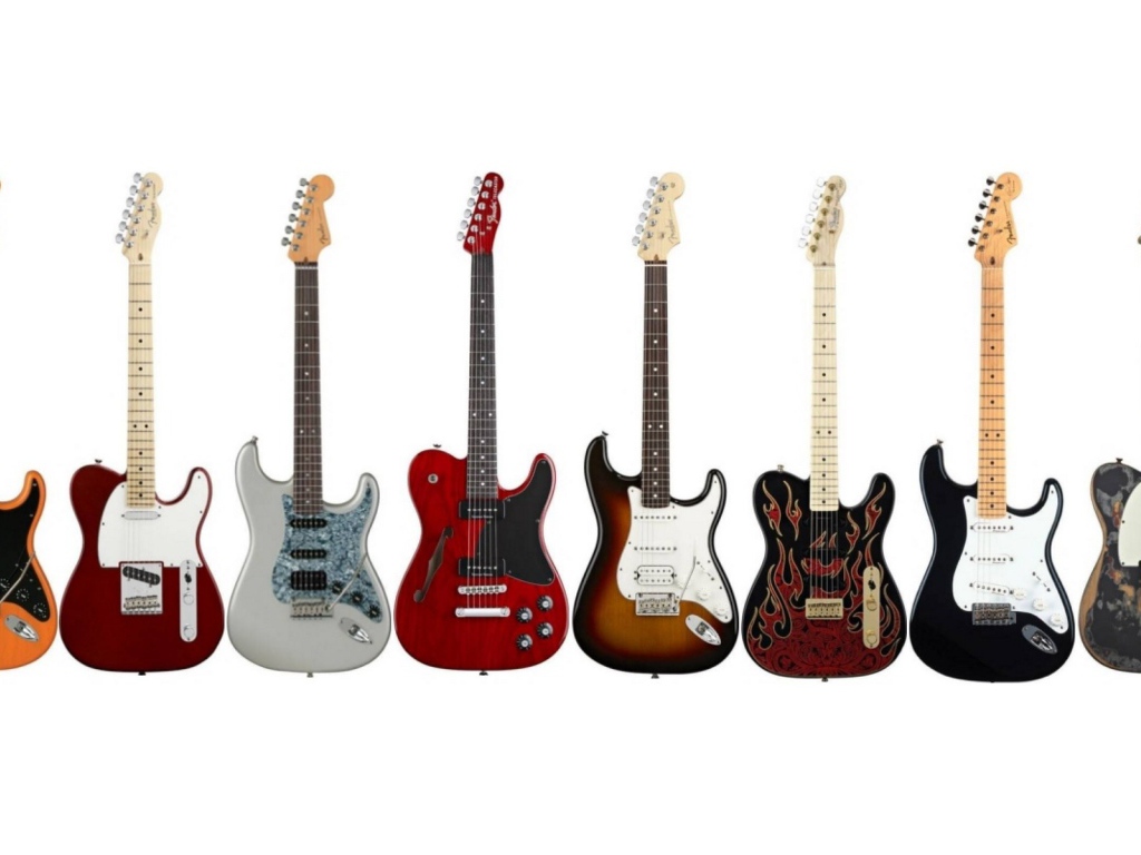 Разные гитары на белом фоне