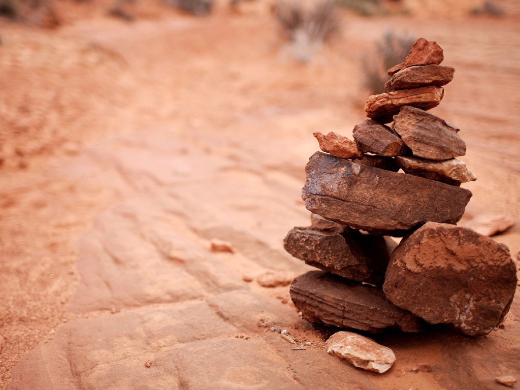 A stack of brown stones on the rock