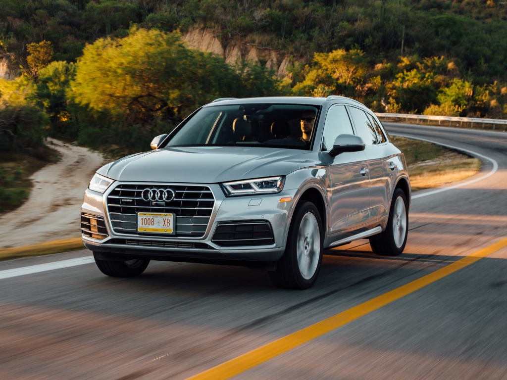 Silvery new car Audi Q5, 2018 on the road