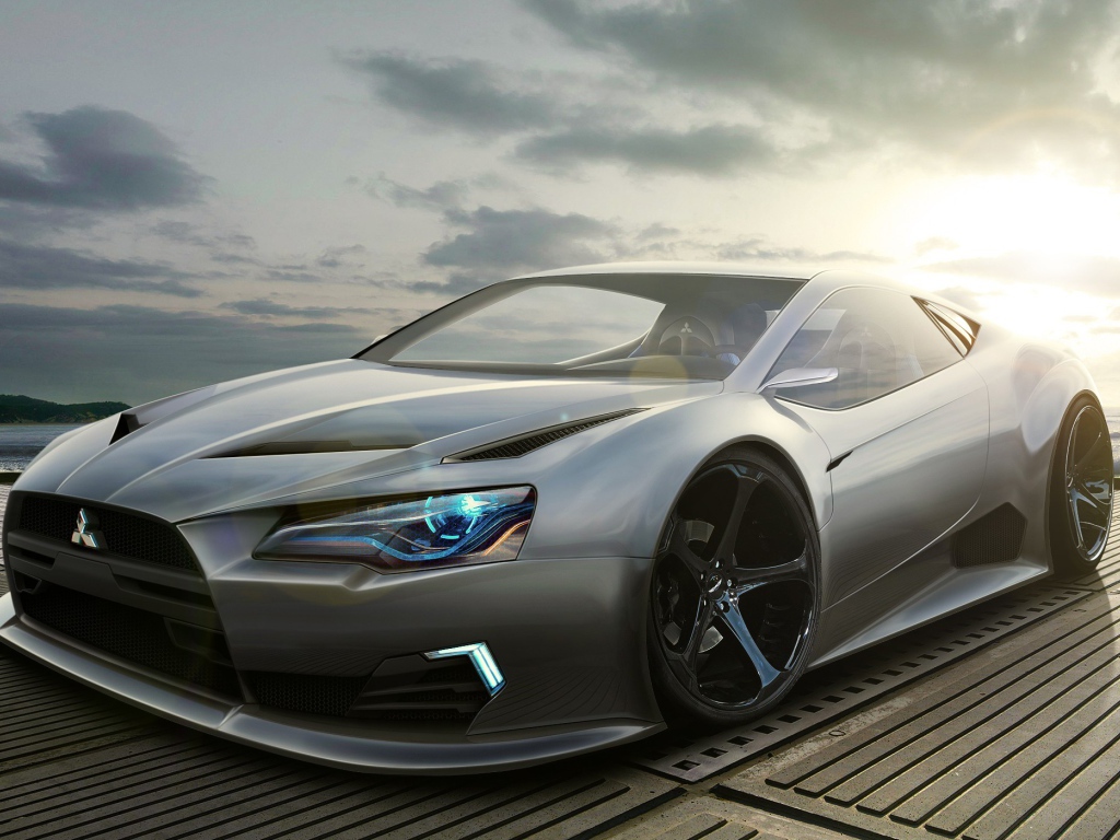 Серебристый автомобиль Mitsubishi в лучах солнца 