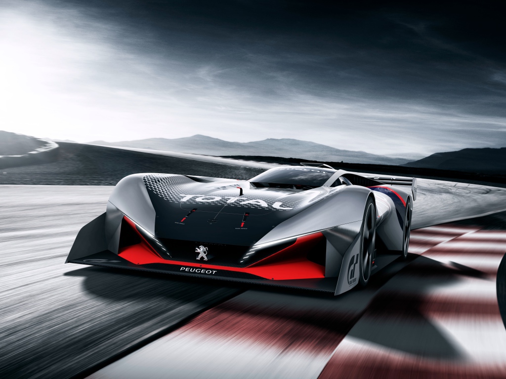 Гоночный автомобиль Peugeot L750 R Hybrid Vision Gran Turismo на трассе