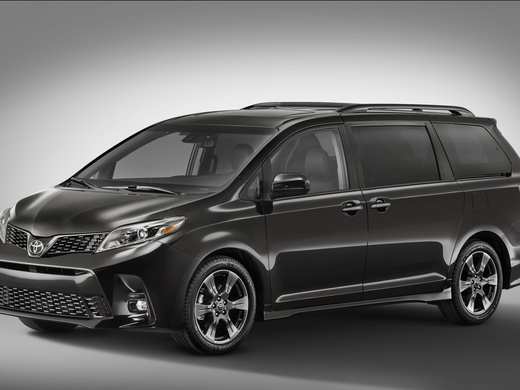 Минивэн Toyota Sienna, 2018 на сером фоне