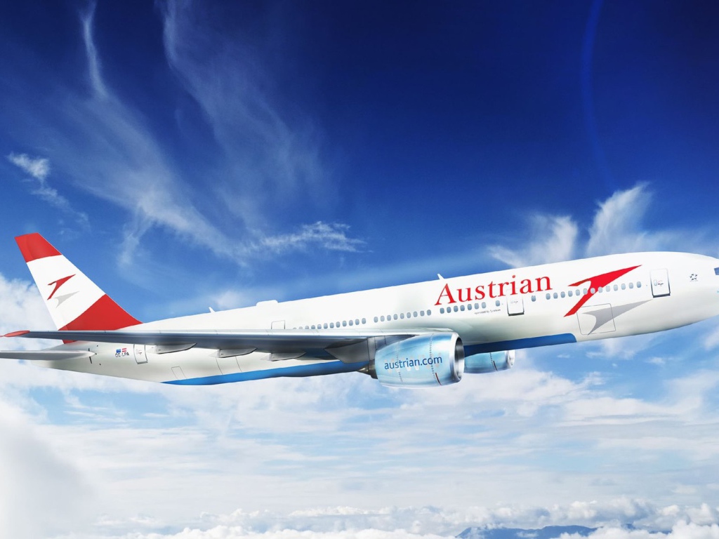 Embraer 195 авиакомпании Austrian Airlines на фоне неба