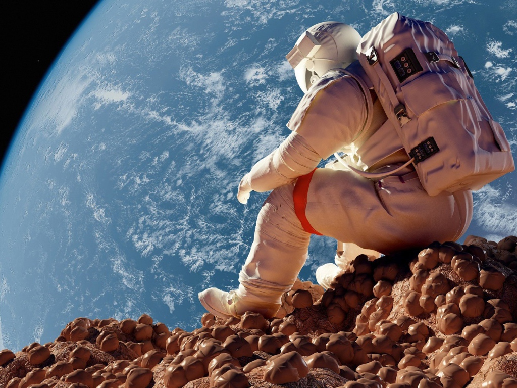 Астронавт на фоне планеты Земля 