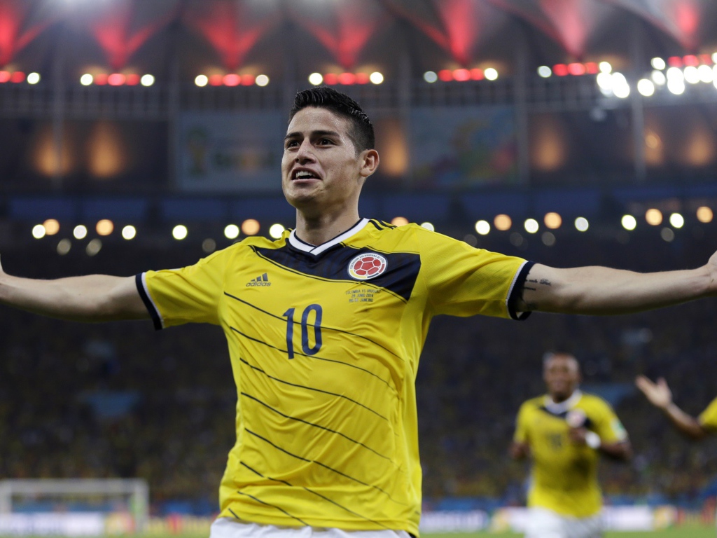 Футболист клуба Реал Мадрид Хамес Родригес радуется победе