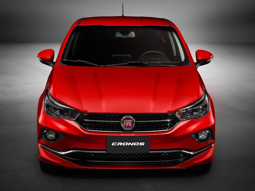 Красный автомобиль Fiat Cronos  2018 года, вид спереди