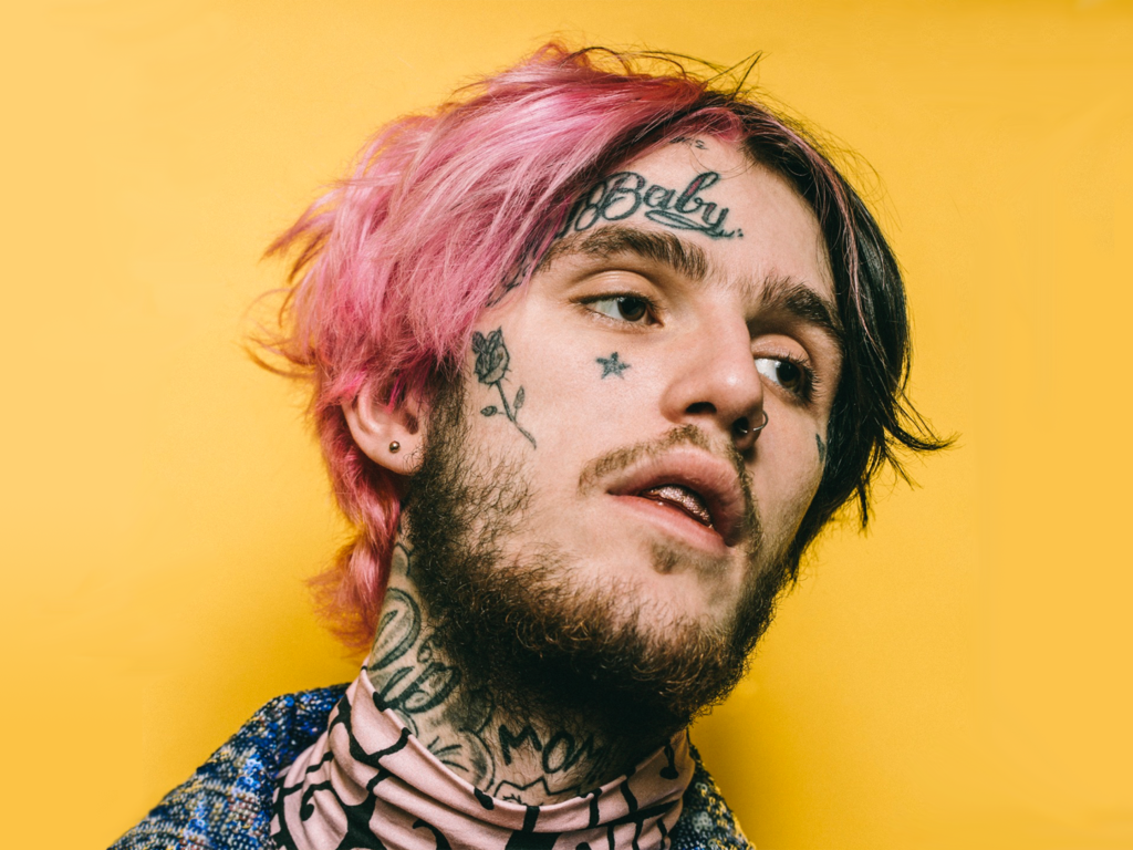 Американский рэпер Lil Peep с татуировками на лице