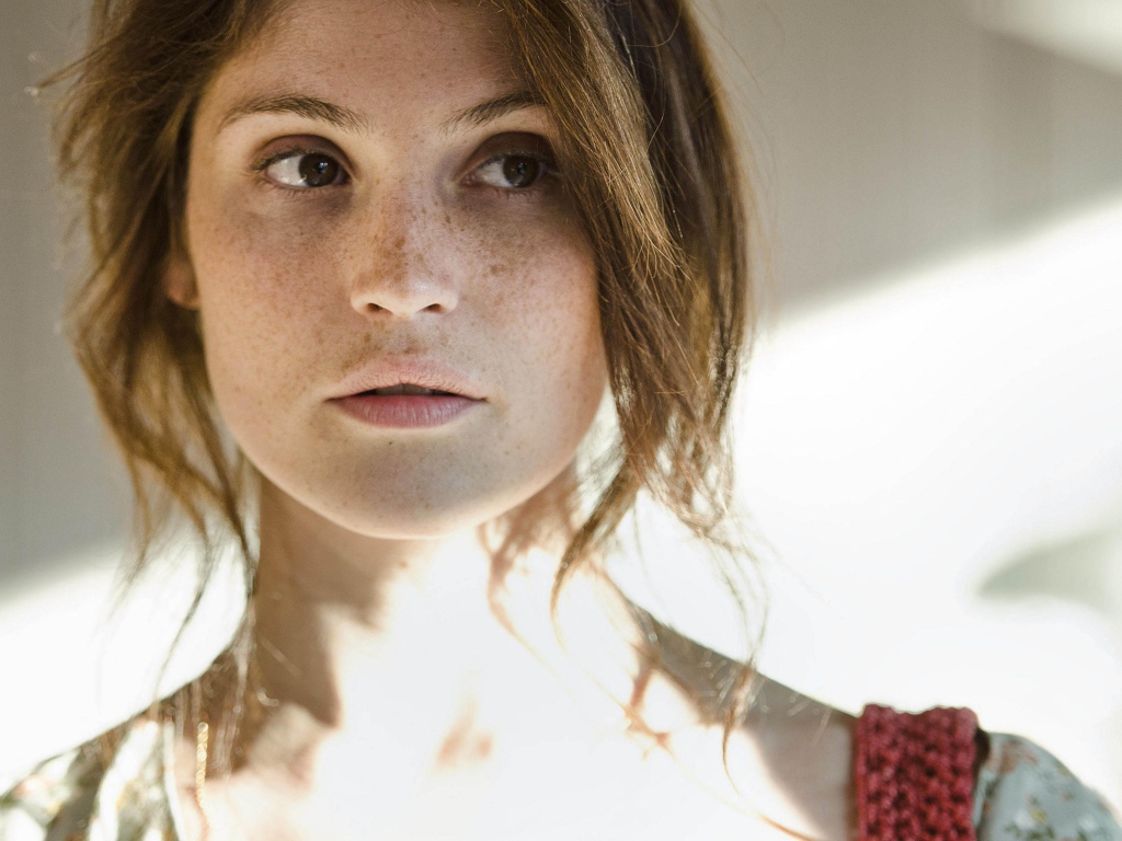 Actress Gemma Arterton with freckles on her face