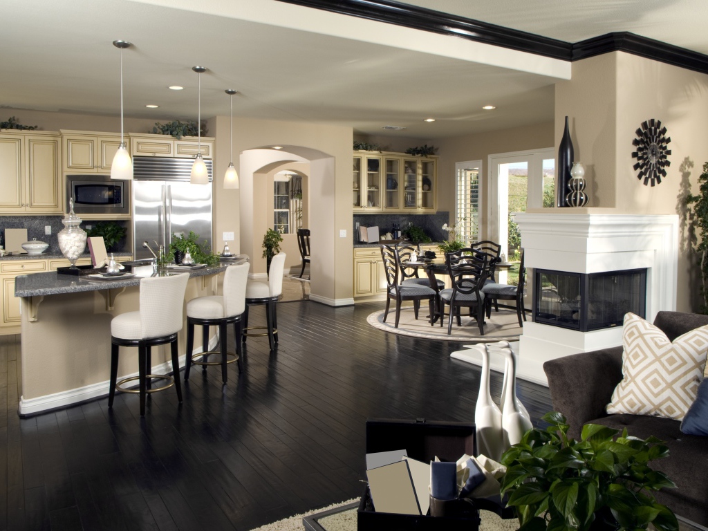 Красивая гостинная с кухней в пастельных тонах 