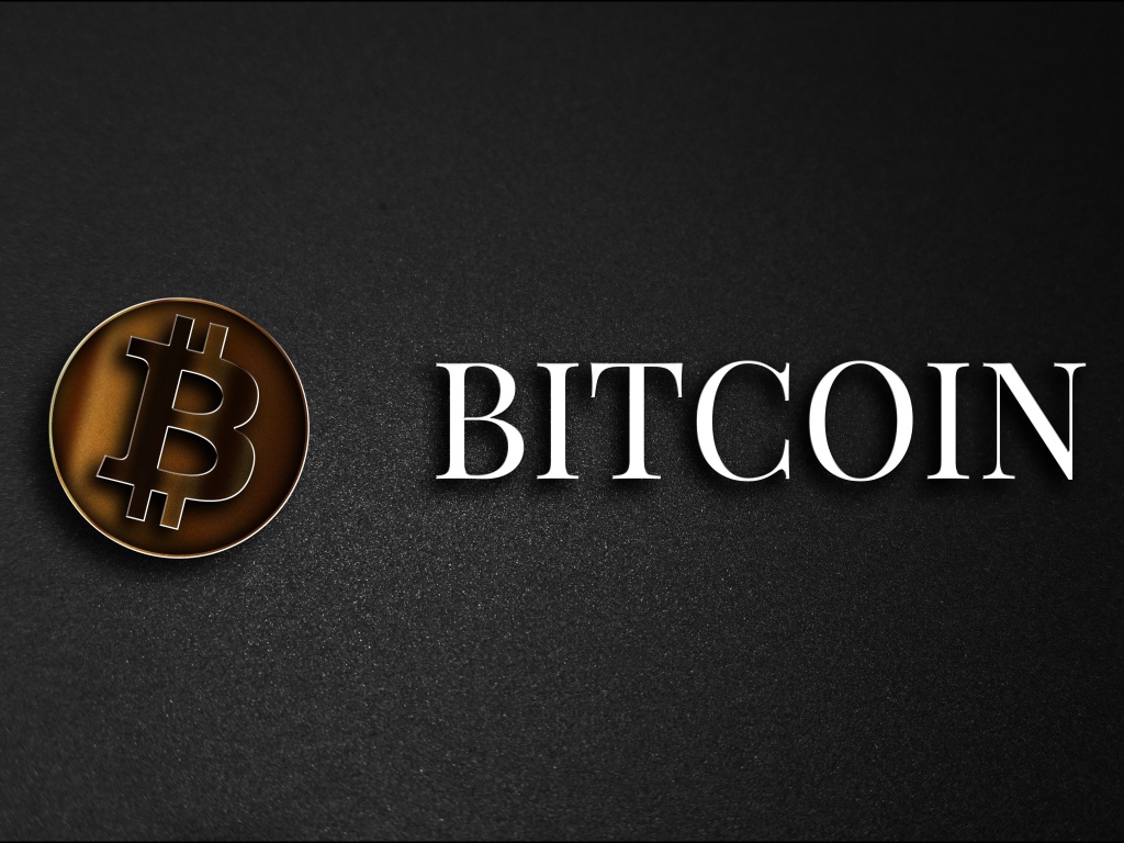 Надпись Биткоин на сером фоне