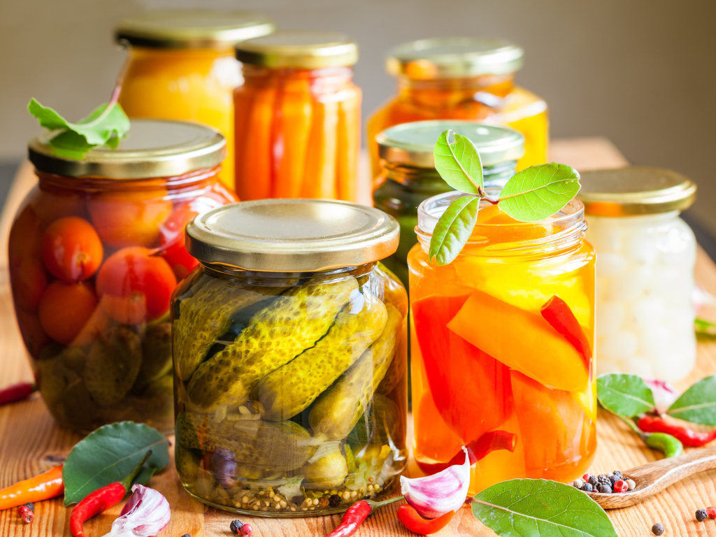 Preservation in glass jars on the table with spices