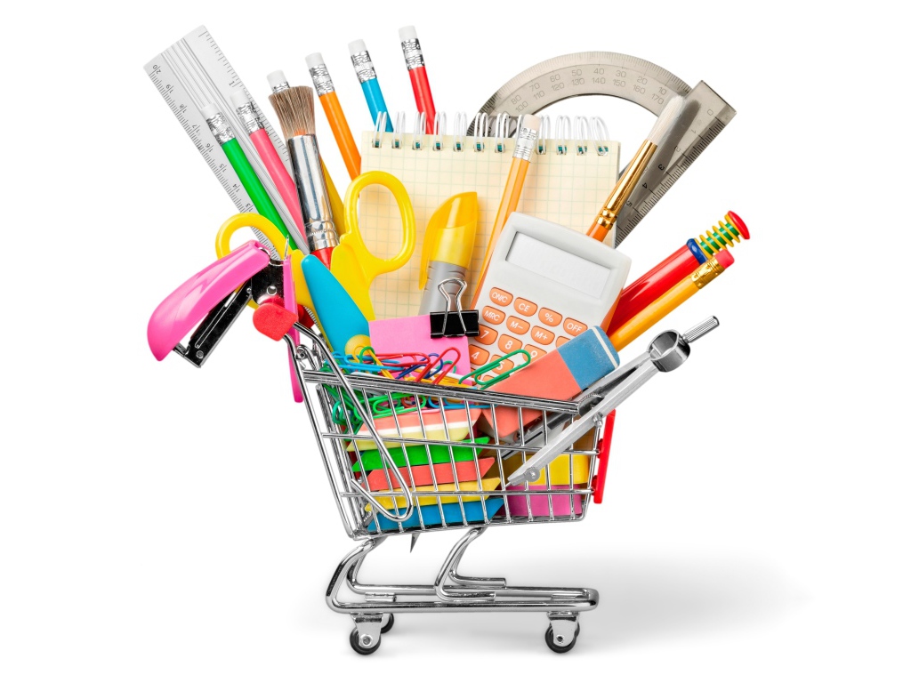 School stationery in trolley on white background