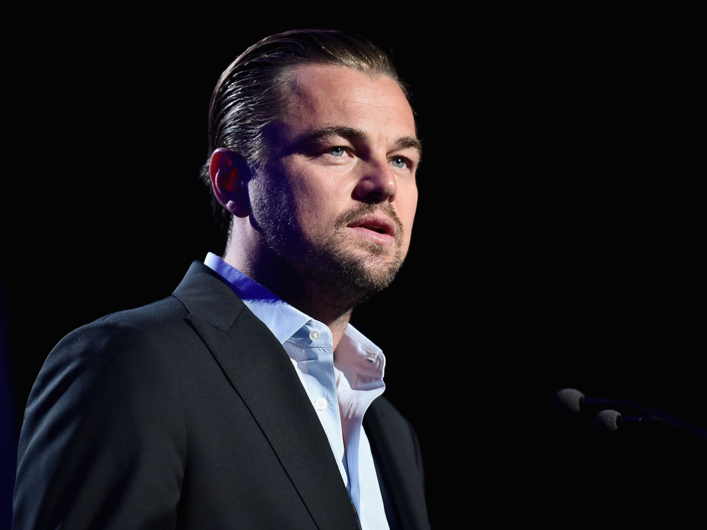 Актер Леонардо Ди Каприо у микрофона