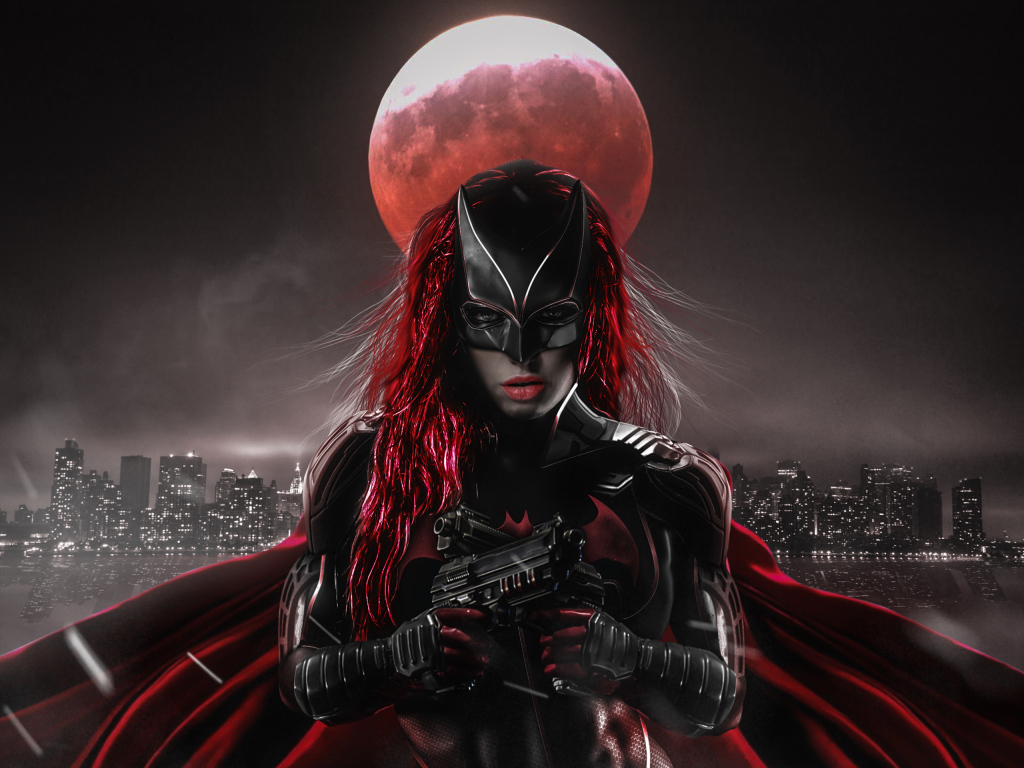 Персонаж Бэтвумен на фоне луны