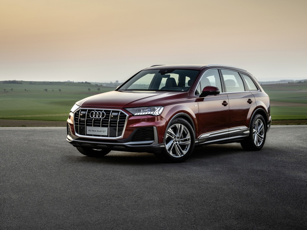 Бордовый внедорожник Audi Q7 55 TFSI Quattro S Line 2020 года