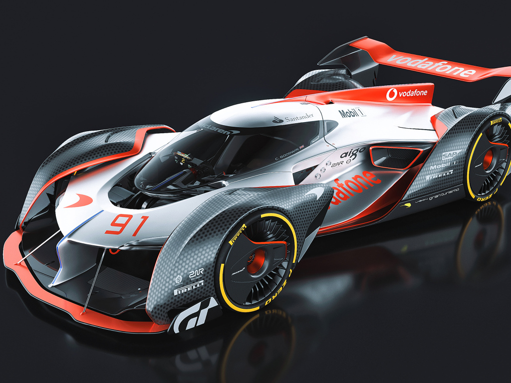 Гоночный автомобиль McLaren Ultimate Vision Gran Turismo на сером фоне