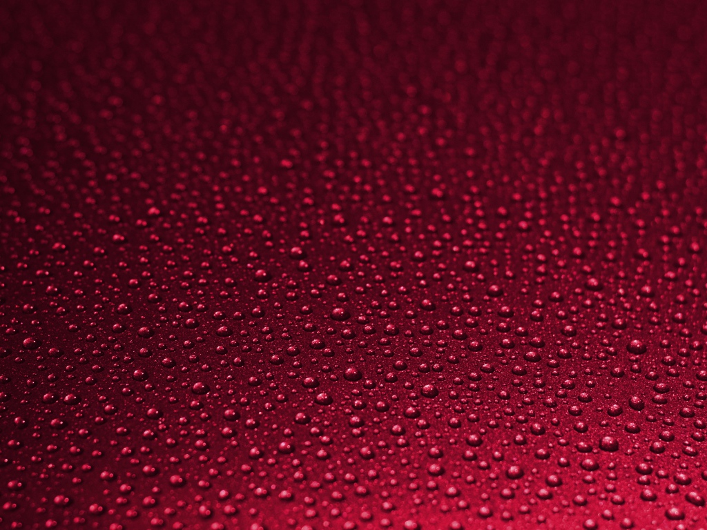 Красный фон с каплями воды 