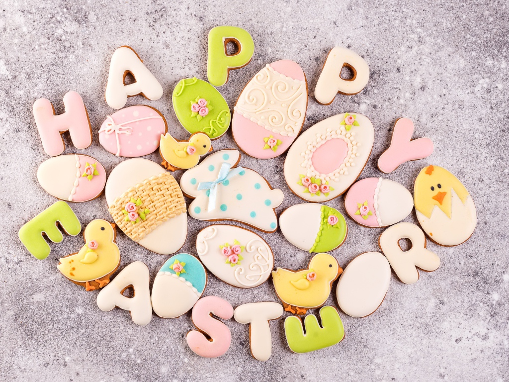 Happy Easter cookies on a gray table