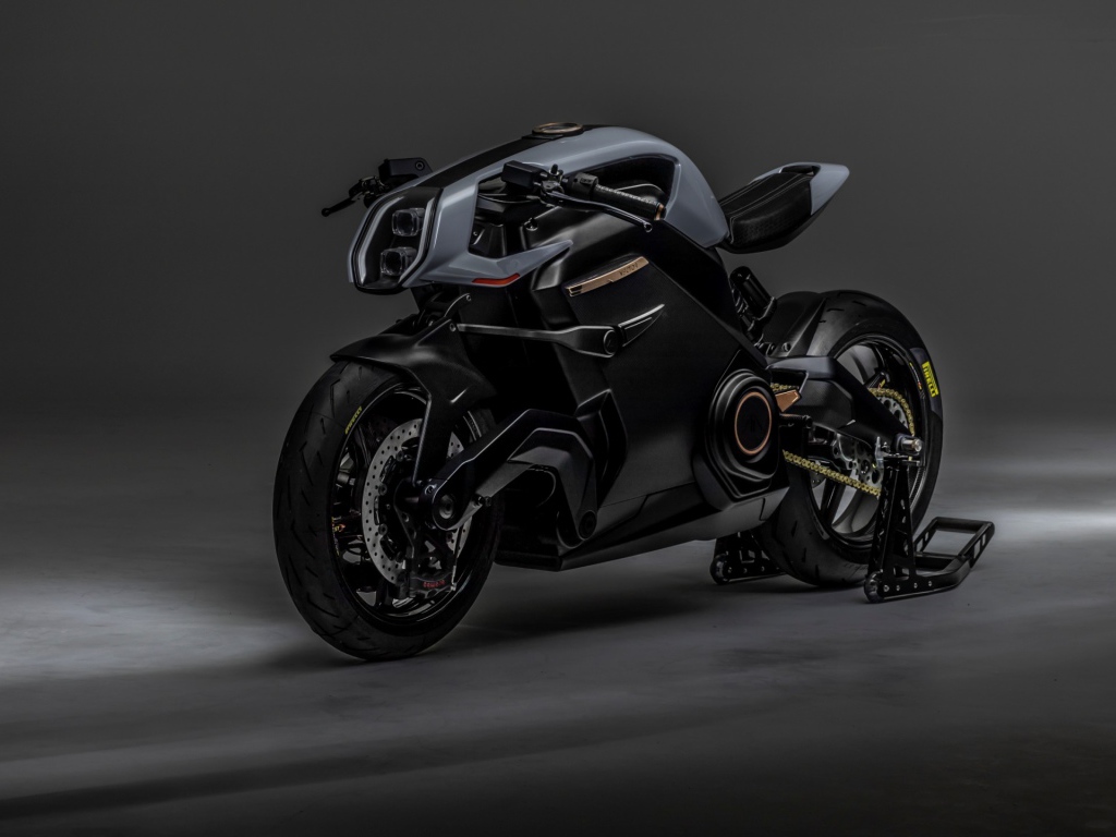 Черный мотоцикл ARC Vector 2021 года на сером фоне