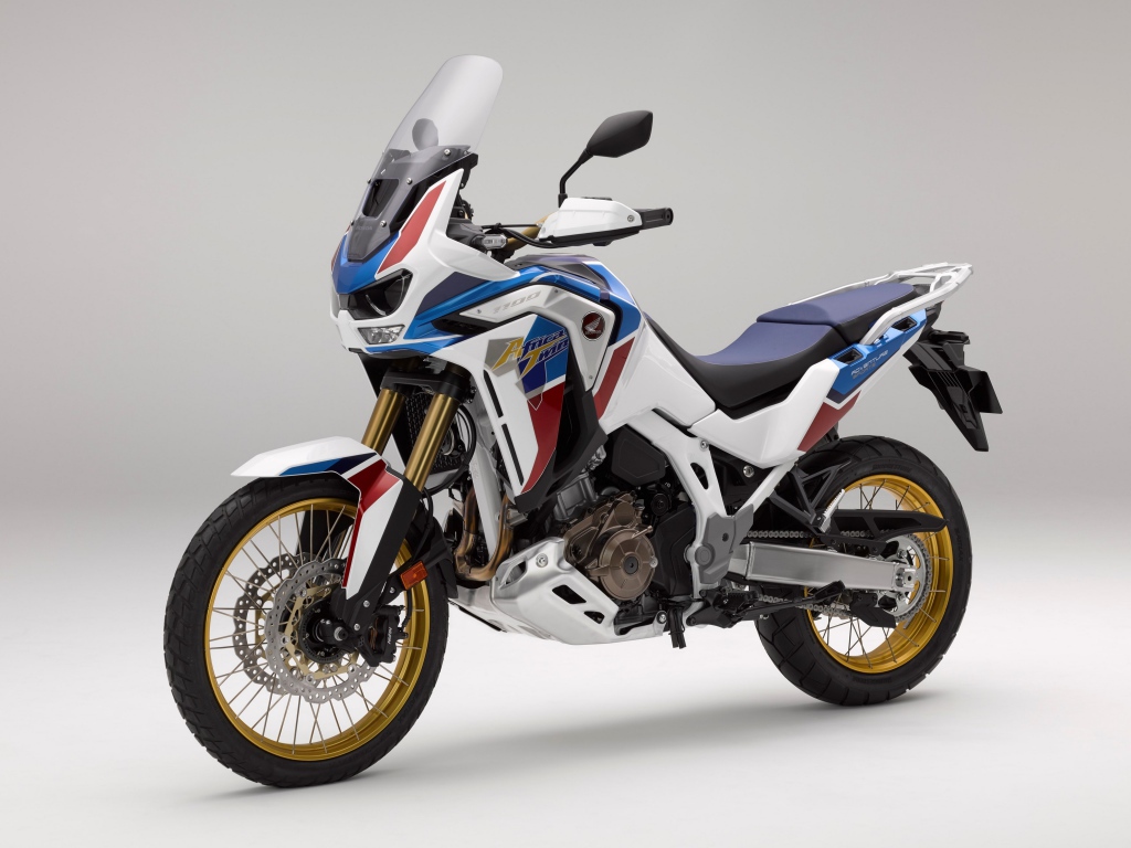 Спортивный мотоцикл Honda  CRF 1000 D, 2020  года на сером фоне