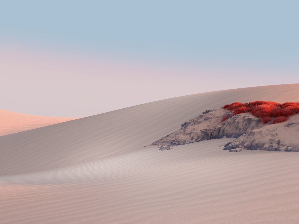 Пустыня с желтым песком на фоне голубого 