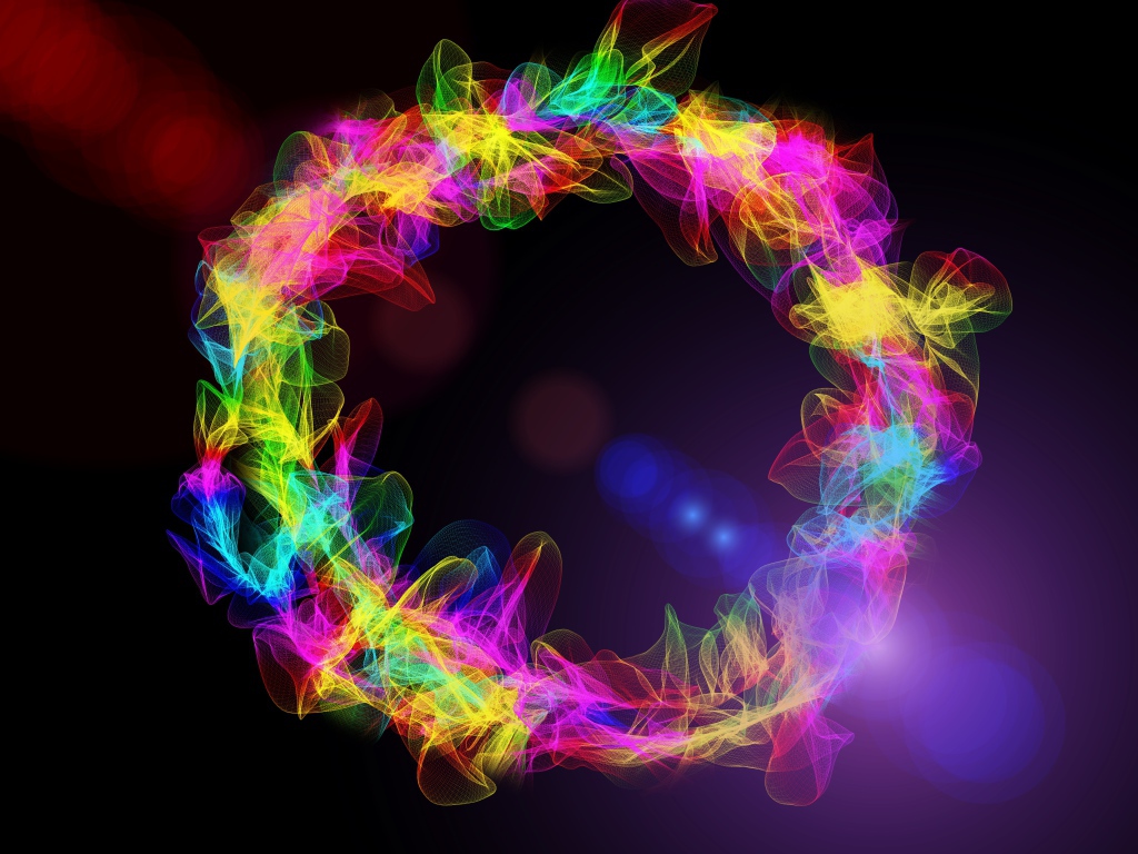 Круг из разноцветных световых волн на черном фоне