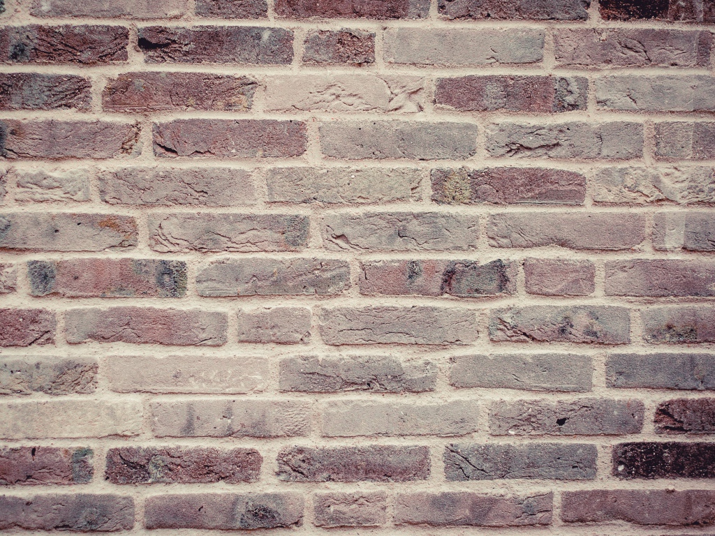 Кирпичная стена фон крупным планом 