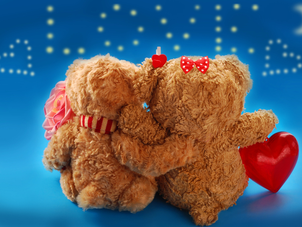 Два влюбленных медведя на голубом фоне на День влюбленных