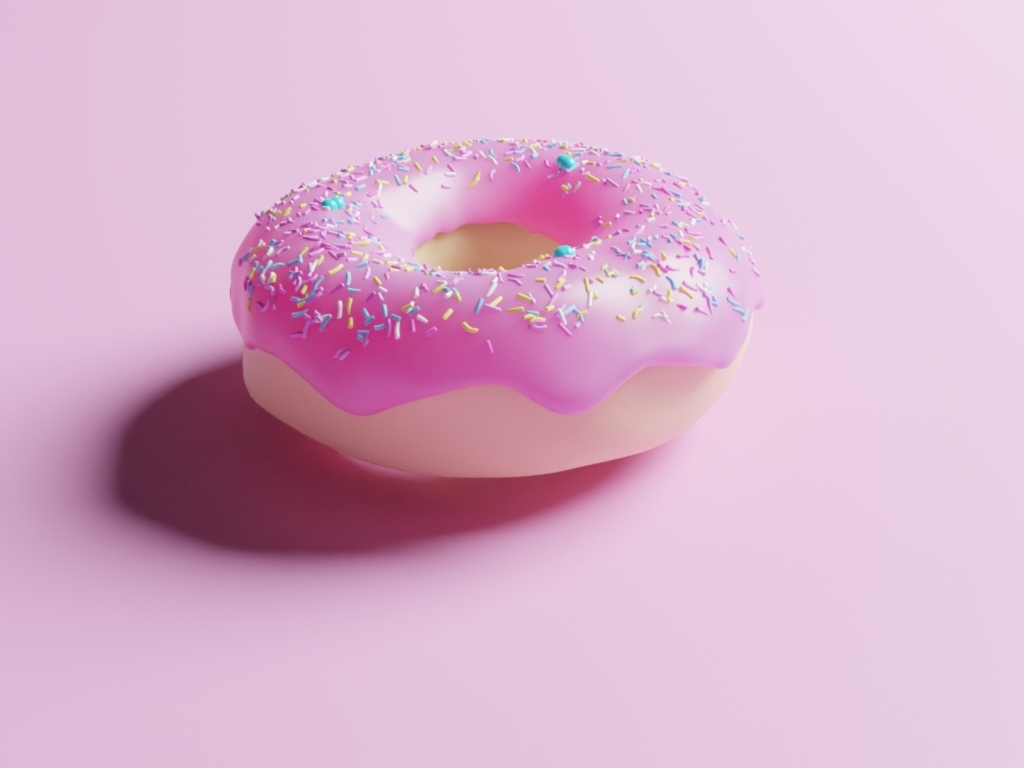 Пончик с глазурью на розовом фоне
