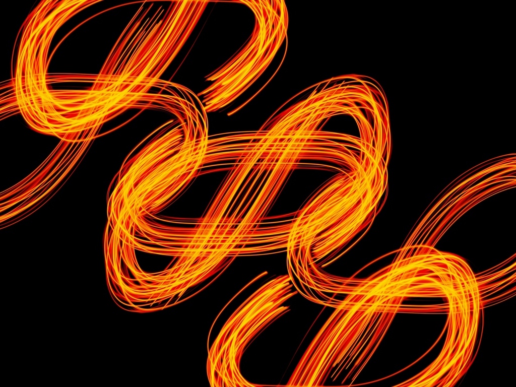 Огненные завитки на черном фоне