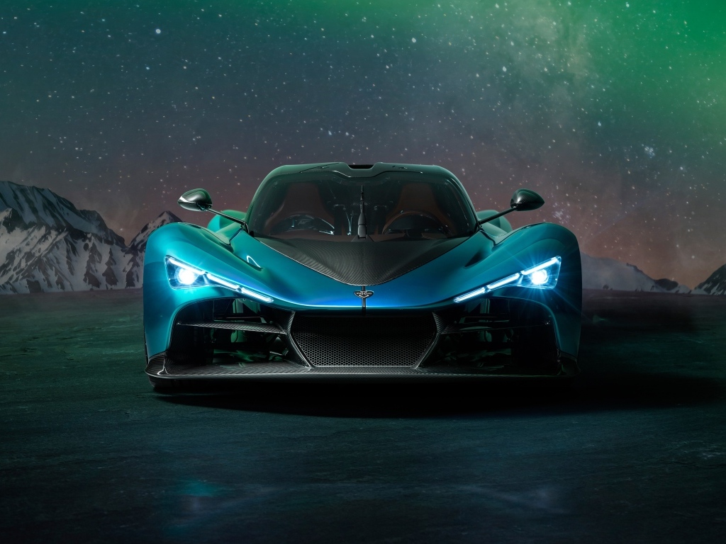 Вид спереди на дорогой автомобиль Zenvo Aurora Agil  ночью