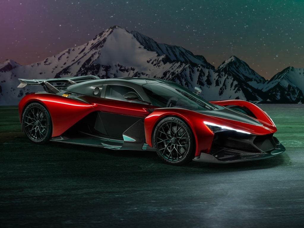 Красный спорткар Zenvo Aurora Agil  на фоне гор