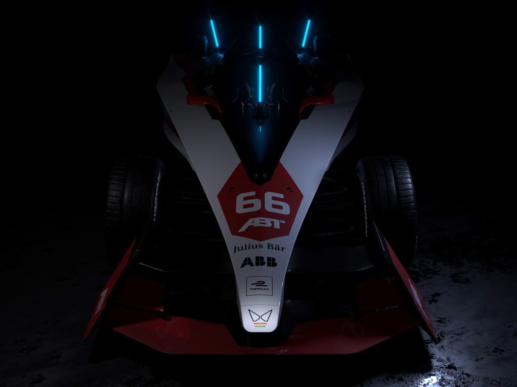 Гоночный автомобиль ABT Sportsline Mahindra M9Electro 2022 на черном фоне