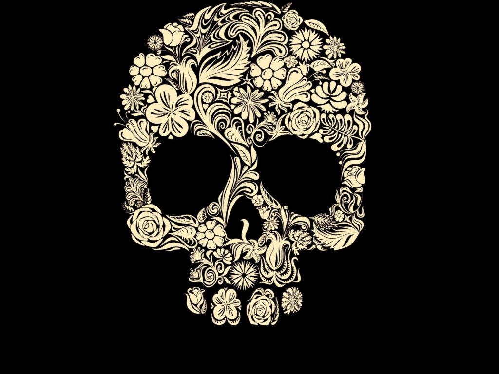 Череп из цветов на черном фоне