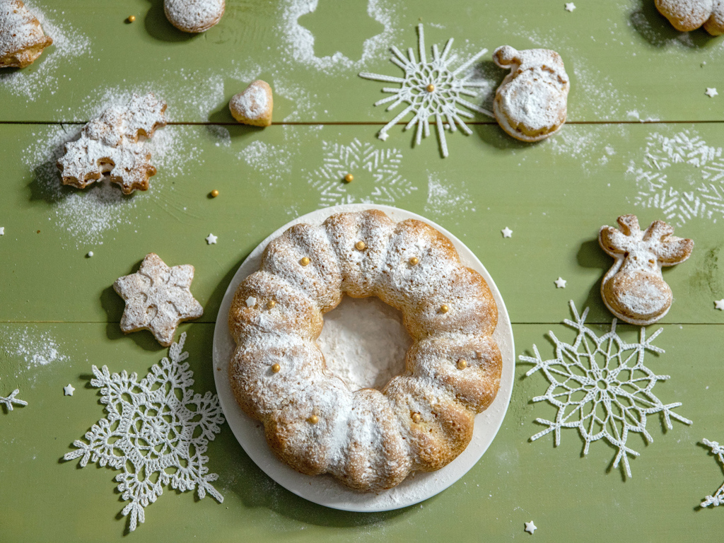 Fragrant cupcake with cookies on the table