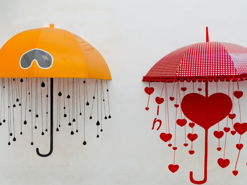 Два нарисованных зонта на серой поверхности