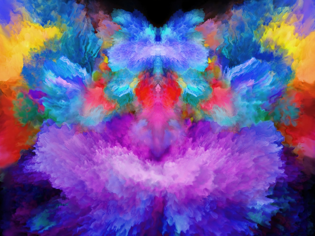 Взрыв разноцветной краски крупным планом