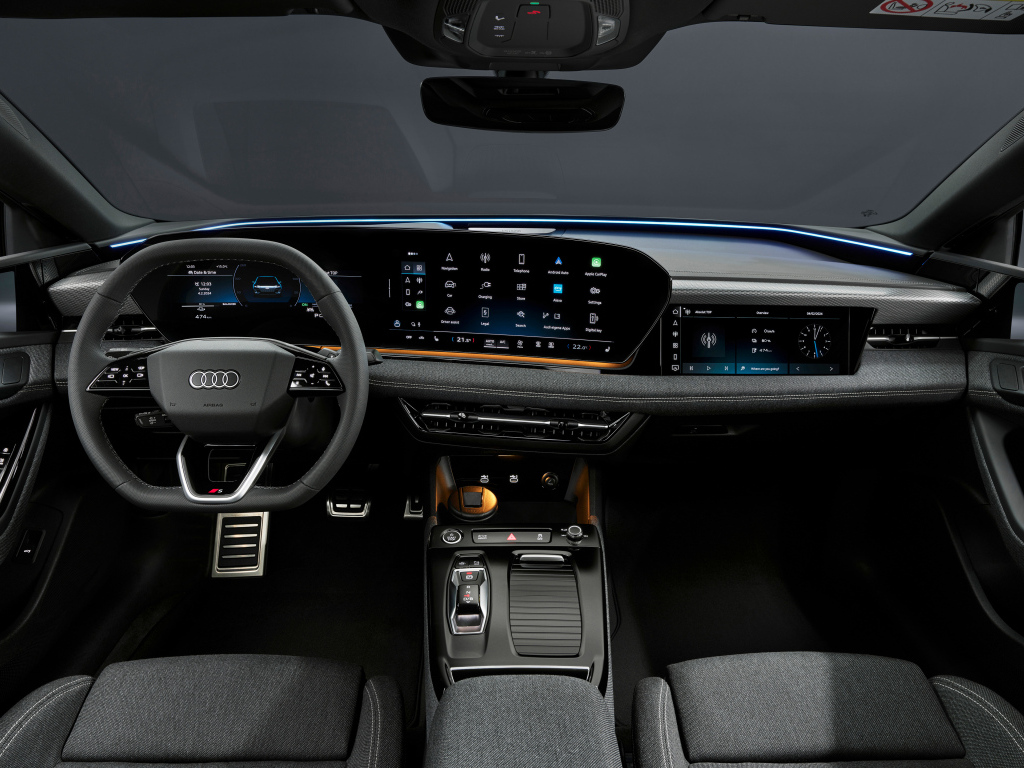 Черный салон автомобиля Audi A6 Sportback e-tron performance 2024 года