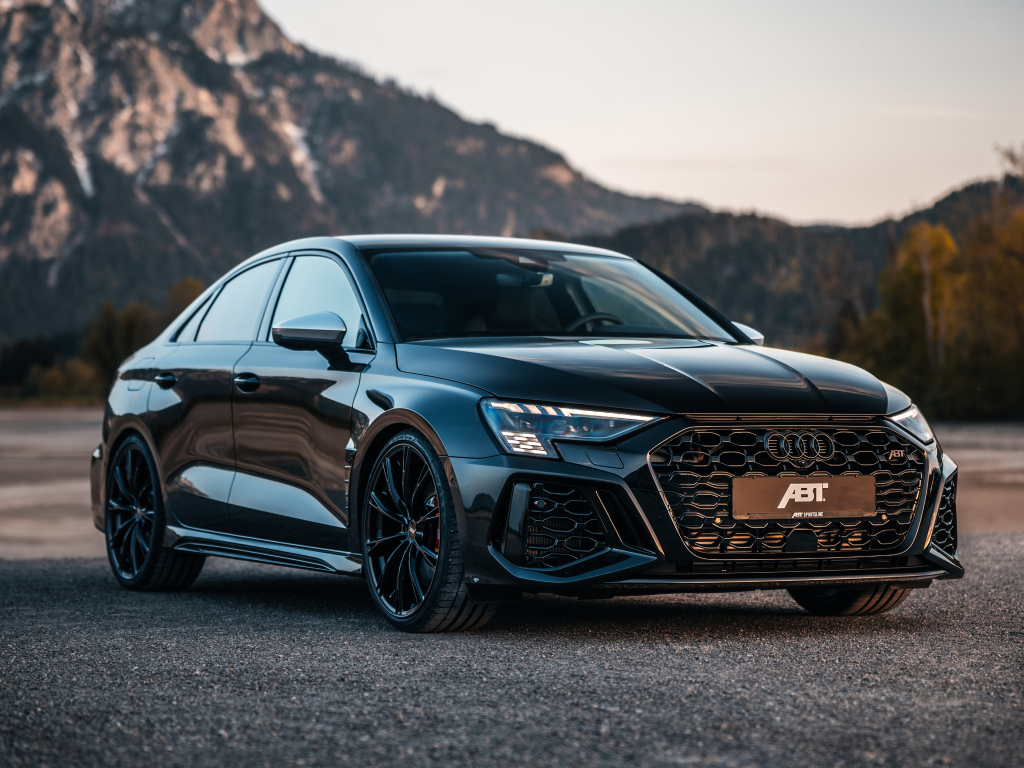 Черный автомобиль  ABT Audi RS 3-S Sedan 2024 года