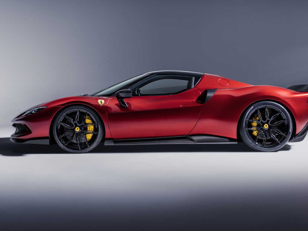 Красный автомобиль Novitec Ferrari 296 GTB Aero 2024 года на сером фоне