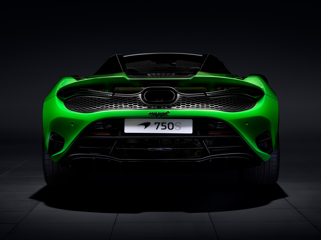 Вид сзади на зеленый автомобиль McLaren 750S