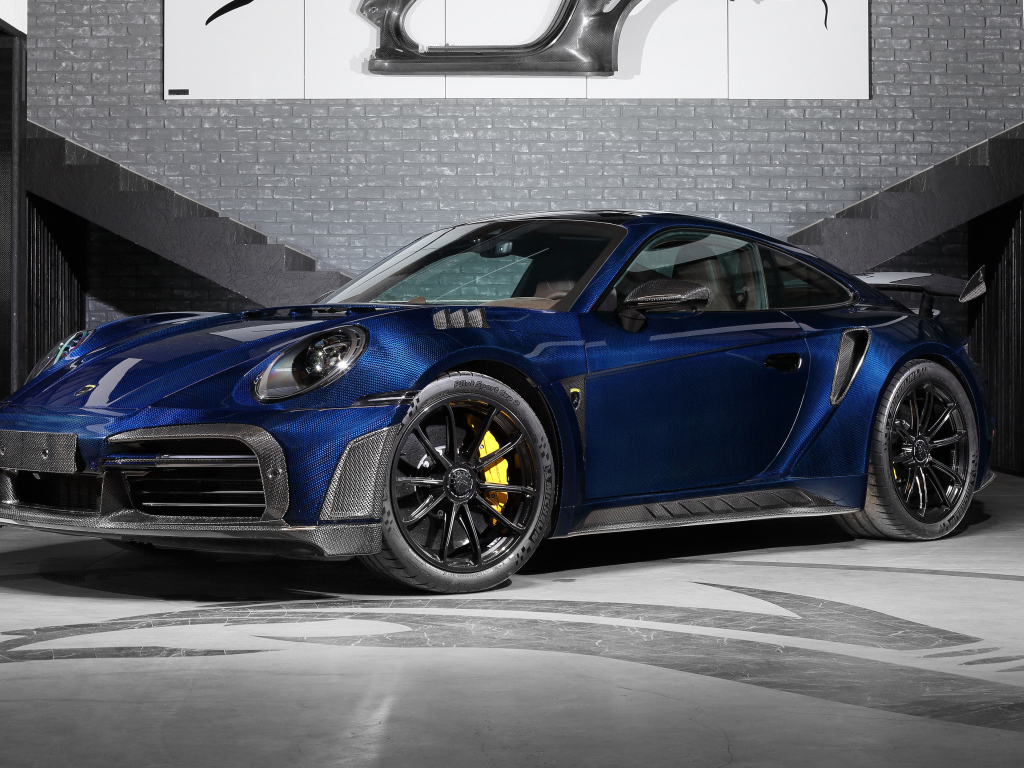 Вид спереди на TopCar Porsche 911 Turbo S Stinger GTR Stealth Edition 2024  года