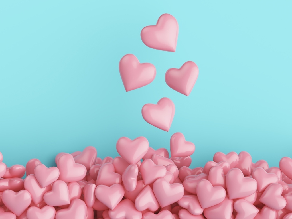Много розовых сердечек на голубом фоне