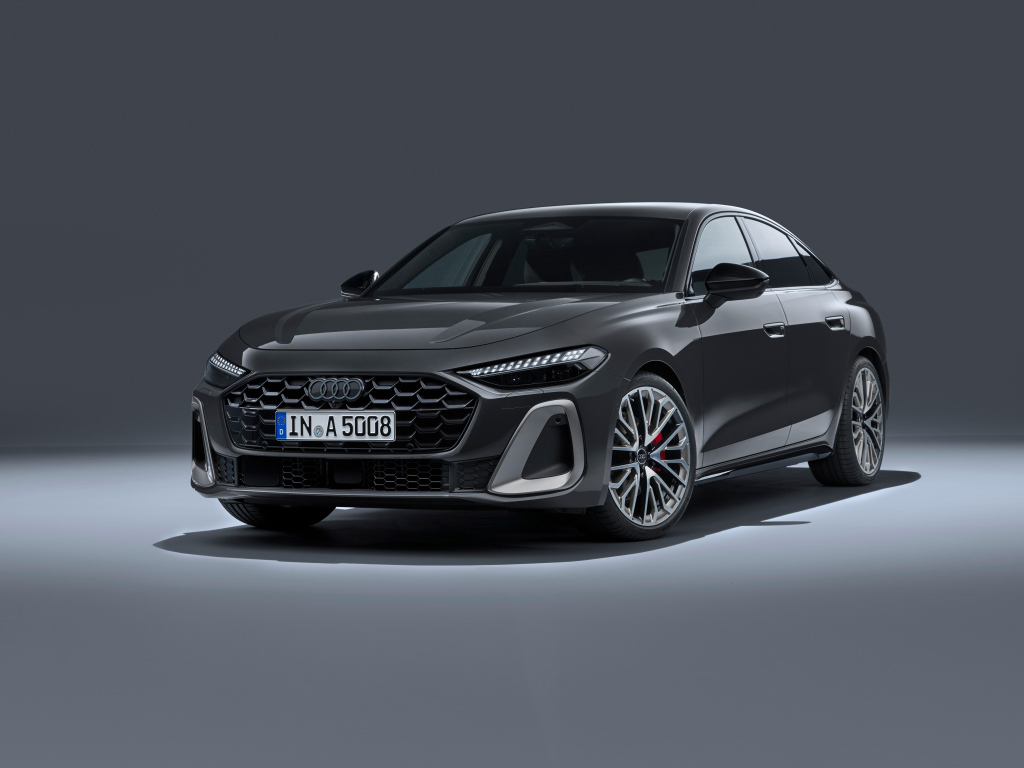 Автомобиль Audi A5 TFSI quattro S line 2024 года на сером фоне