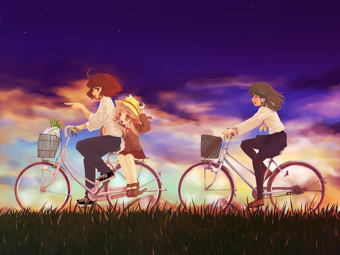 Girls riding on bicycles